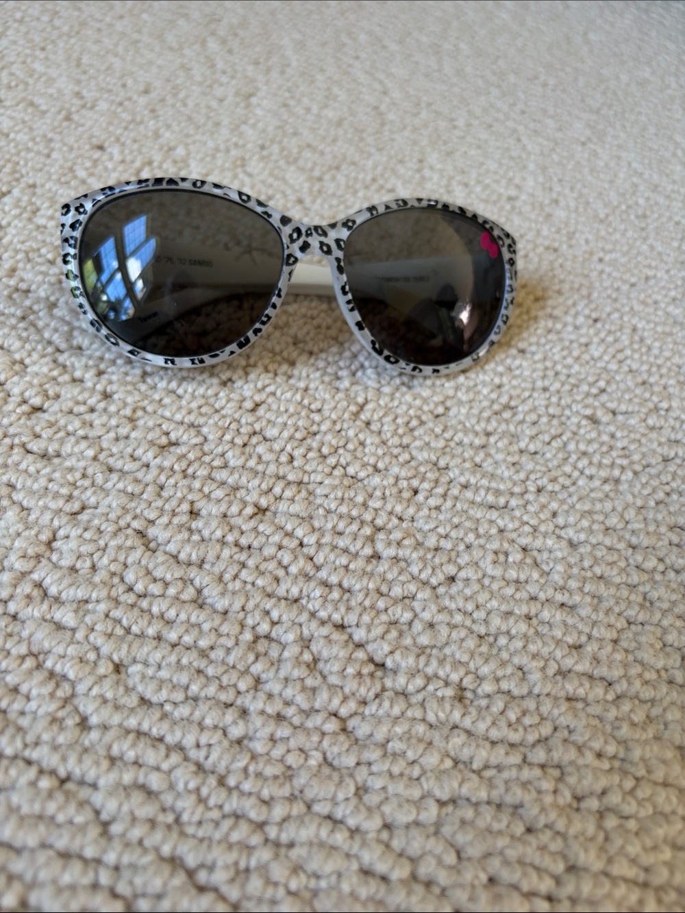 Sanrio Kids Leopard Print Sunglasses with Black Lenses and Pink Bow Accent